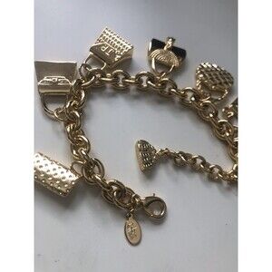 Joan Rivers Signed Rare Pocketbook Dangle Charms  Bracelet Gold Tone 8.5”